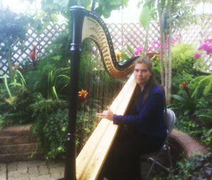 Glenna and harp at Floral Conservatory